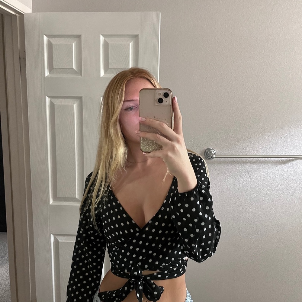 Polka dot cropped long sleeve wrap top